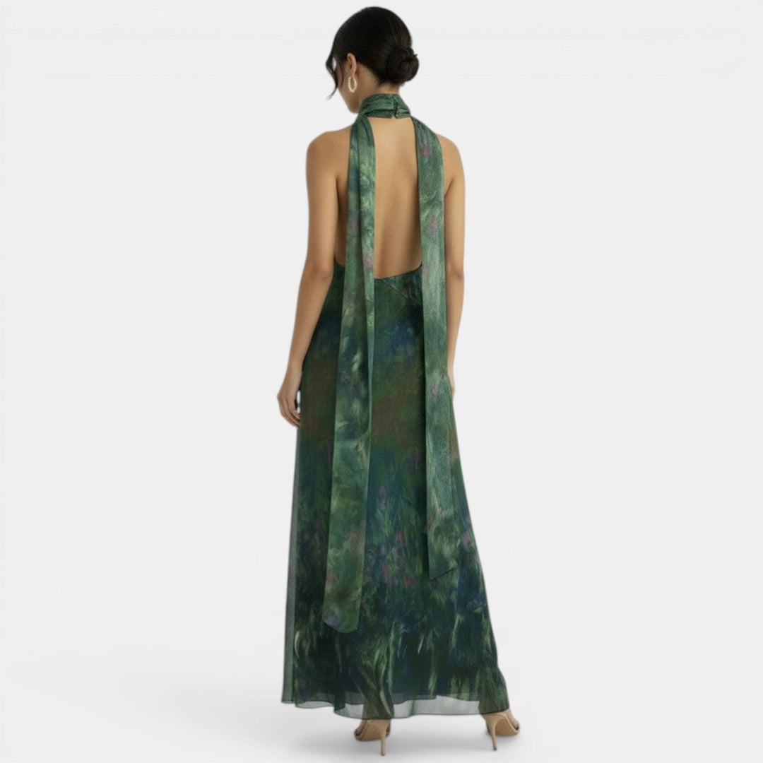 Vestido verde halter con lazo y espalda descubierta para mujer. Ideal para cóctel, fiesta u ocasiones especiales.