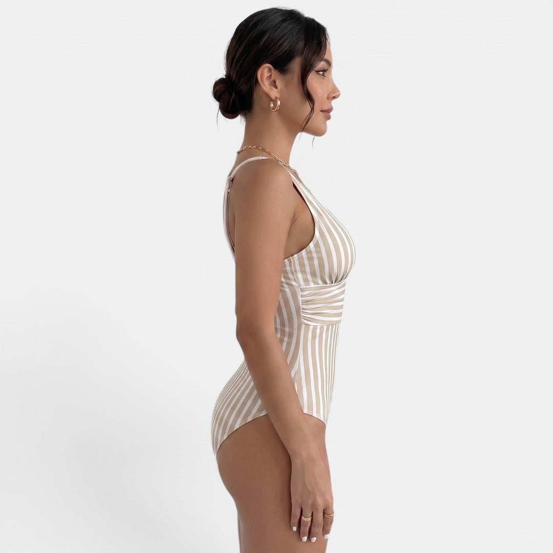 Bañador de mujer estilo retro, reductor y elegante. Escote V favorecedor para tus vacaciones de verano.