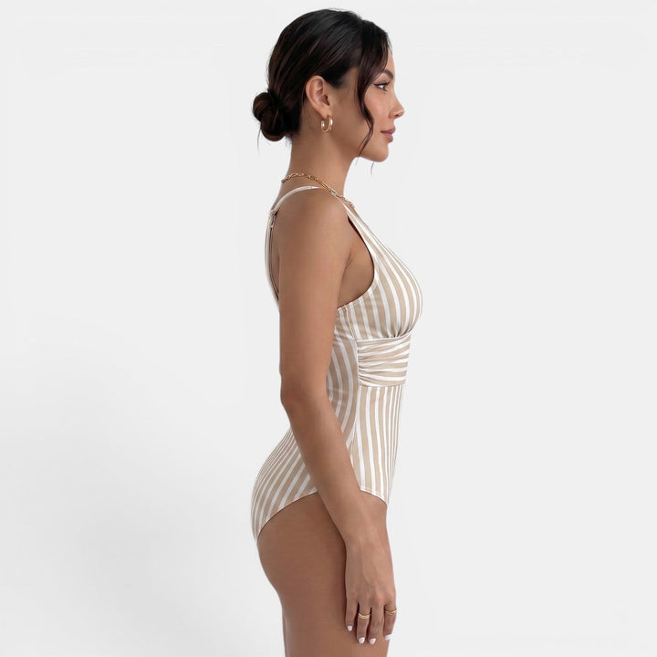 Bañador de mujer estilo retro, reductor y elegante. Escote V favorecedor para tus vacaciones de verano.