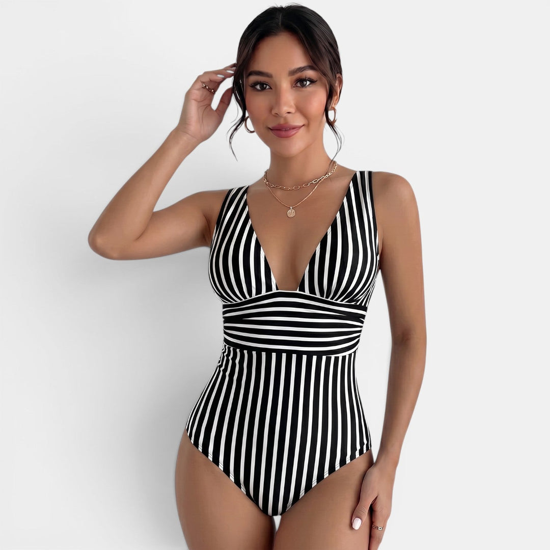 Bañador reductor mujer escote V, traje de baño moldeador para playa y piscina. Confort y estilo retro.