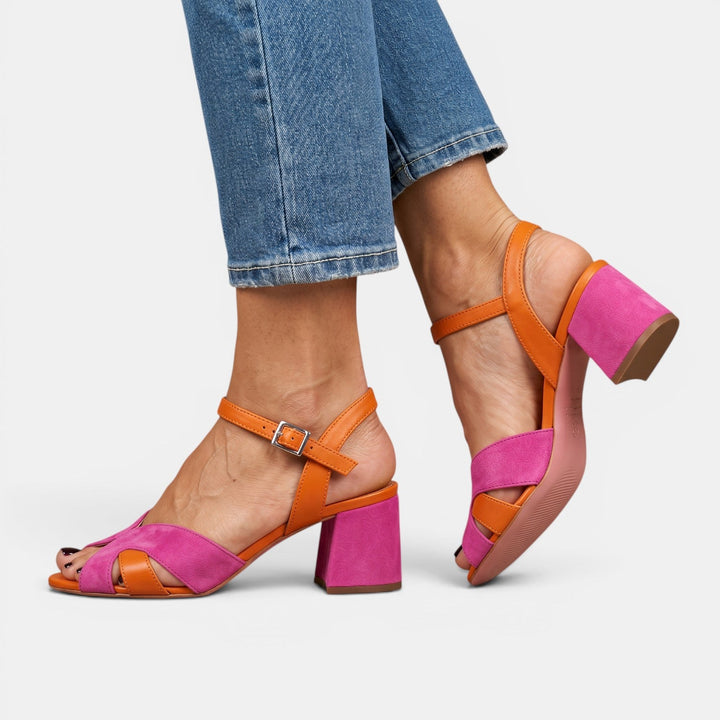 Sandalias ortopédicas de tacón rosa para mujer, elegantes y cómodas, ideales para verano o eventos.