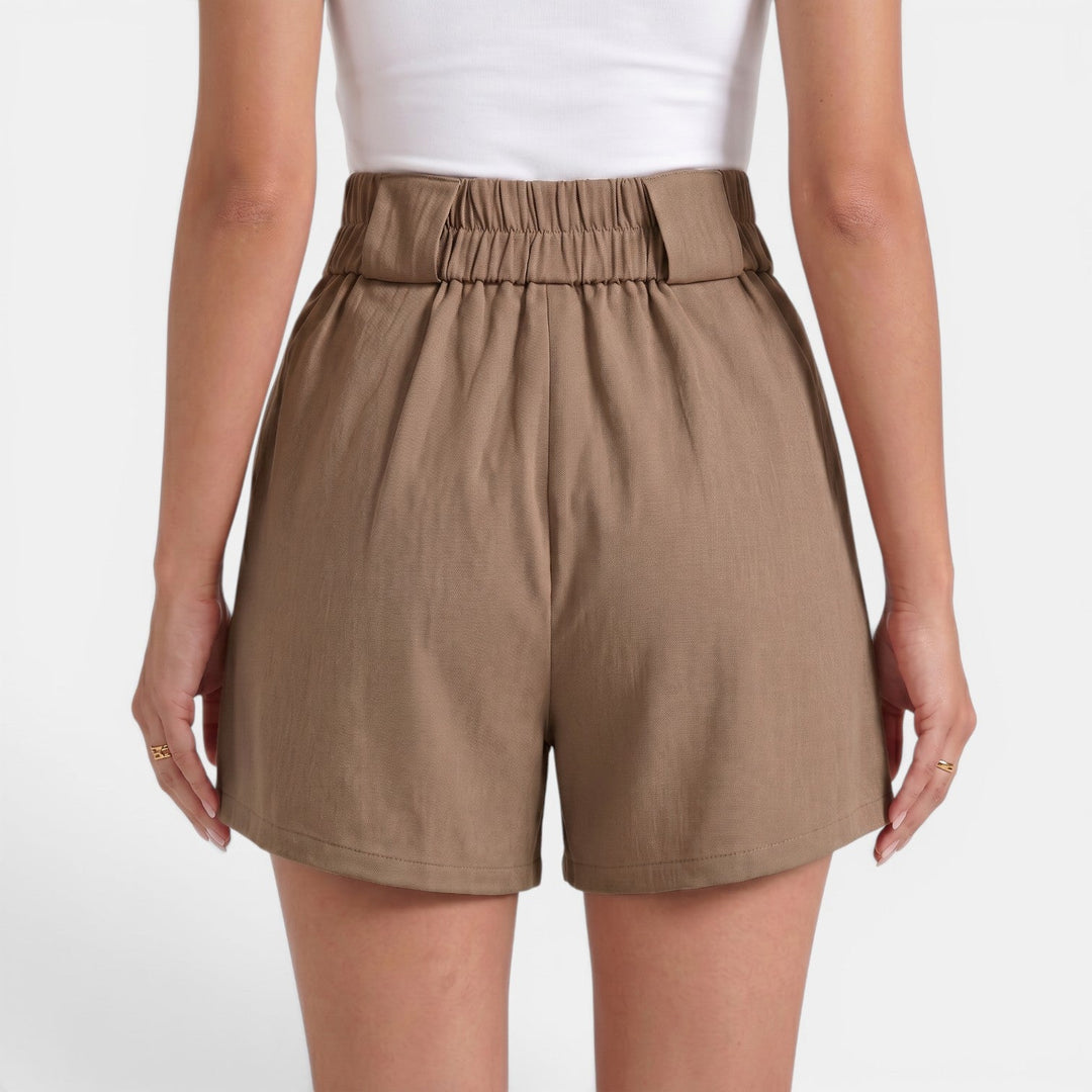 Comodidad total con estos shorts sueltos de cintura alta para mujer en verano.