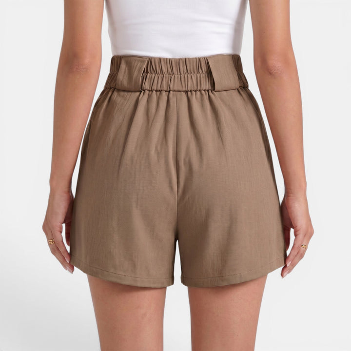 Comodidad total con estos shorts sueltos de cintura alta para mujer en verano.
