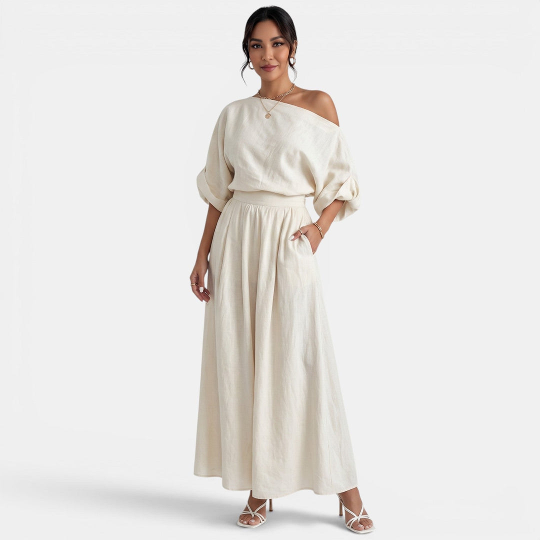 Conjunto mujer elegante: top Bardot hombros descubiertos y pantalón fluido.