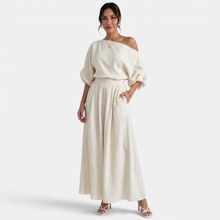 Conjunto mujer elegante: top Bardot hombros descubiertos y pantalón fluido.