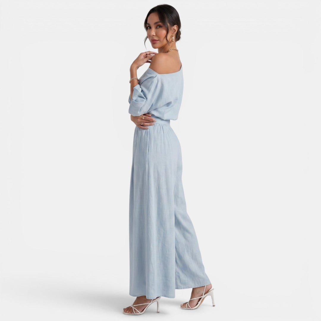 Conjunto elegante de top Bardot y pantalón fluido para mujer, estilo versátil.