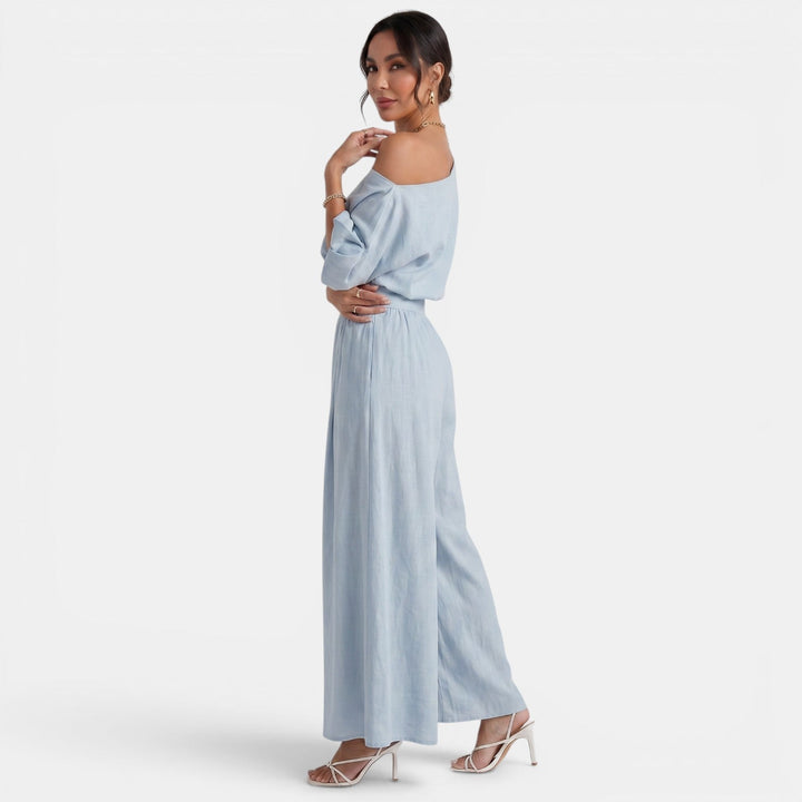 Conjunto elegante de top Bardot y pantalón fluido para mujer, estilo versátil.