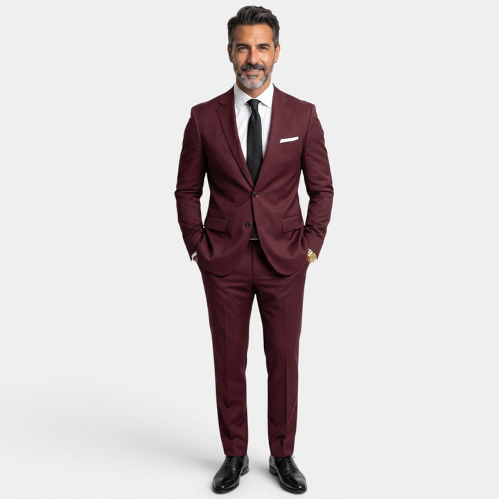 Traje formal de negocios para hombre, dos piezas. Elegante y versátil para bodas o reuniones.