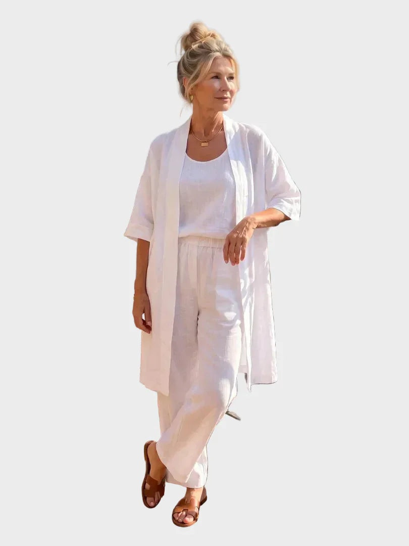 Elegante conjunto de lino mujer. Tres piezas con pantalón ancho y chaqueta larga, ideal para eventos de verano.