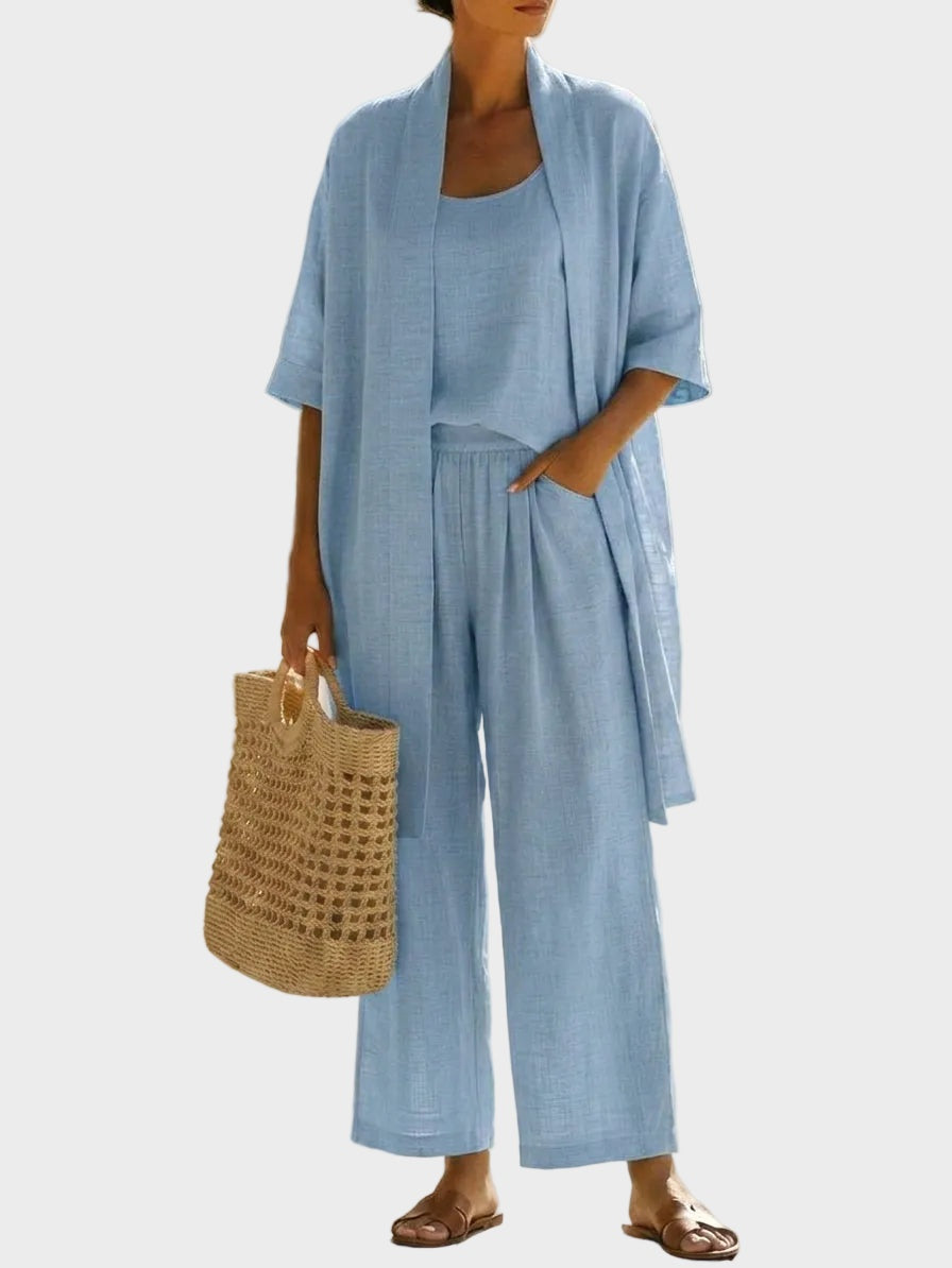 Conjunto lino casual de tres piezas para mujer. Perfecto para verano, con pantalón ancho y chaqueta larga.
