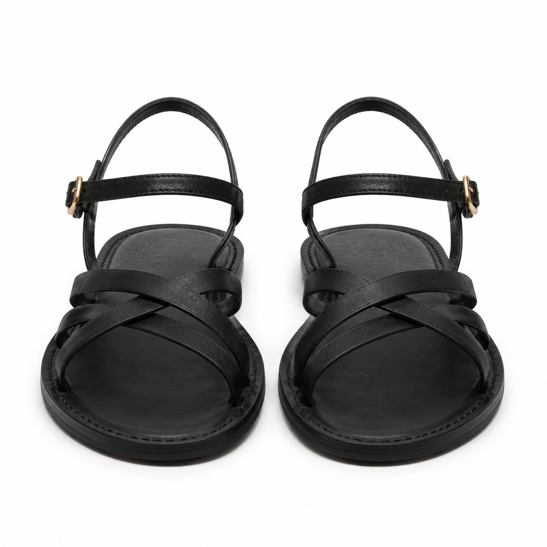 Sandalias negras de mujer con tiras cruzadas, ideales para un estilo casual y confort diario en verano.