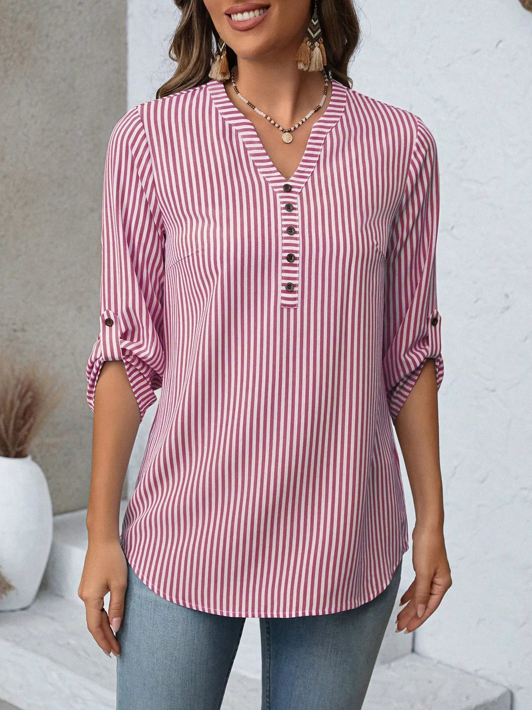 Blusa de mujer con cuello V, diseño a rayas, manga larga ajustable, estilo versátil y casual.