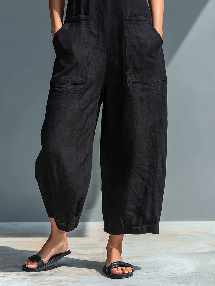 Mono de lino para mujer, sin mangas, cuello alto. Estilo minimalista, fresco y cómodo para verano.