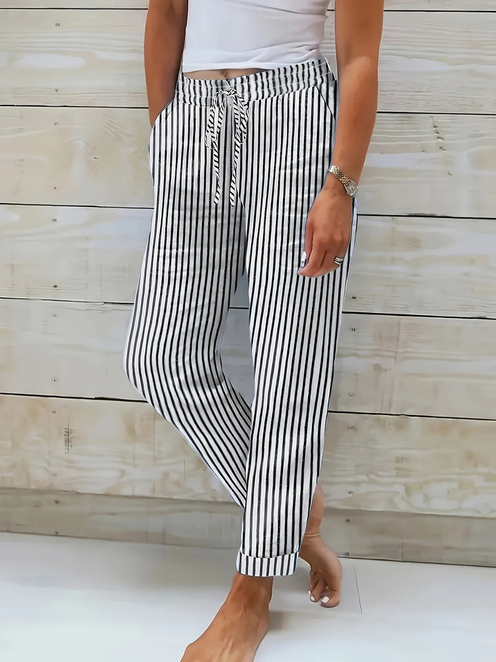 Pantalón de rayas para mujer, diseño fluido con cintura elástica, perfecto para un estilo cómodo y moda de verano.