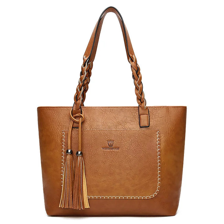 Bolso de mano estructurado para mujer en cuero sintético, elegante y atemporal, ideal para oficina o diario.