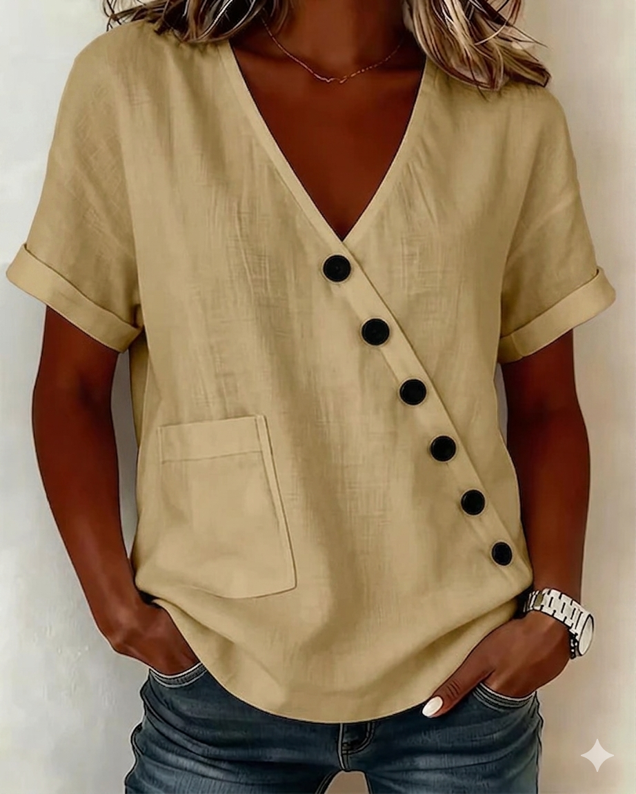 Blusa moderna de mujer con botones diagonales. Top holgado y cómodo, perfecto para moda femenina de verano.