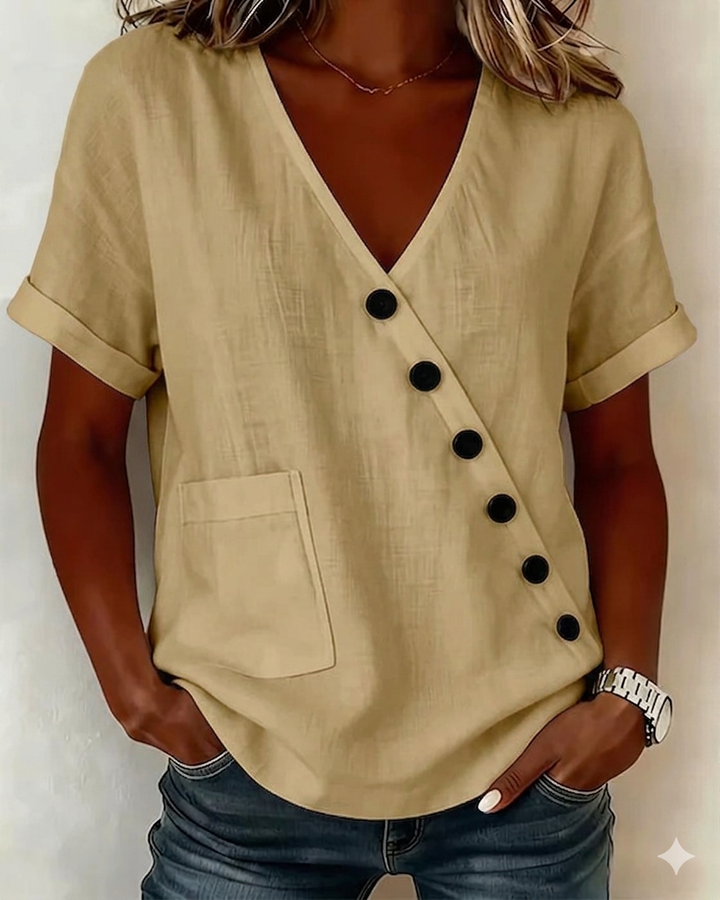 Blusa moderna de mujer con botones diagonales. Top holgado y cómodo, perfecto para moda femenina de verano.