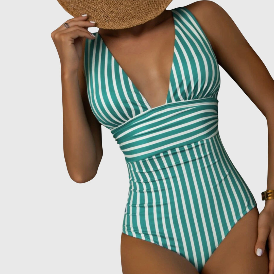 Traje de baño de mujer elegante con escote V y rayas, ideal para el verano, la piscina o la playa.