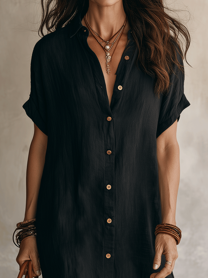Elegante vestido camisa midi de mujer, versátil para verano. Diseño con botones, manga corta y estilo casual.