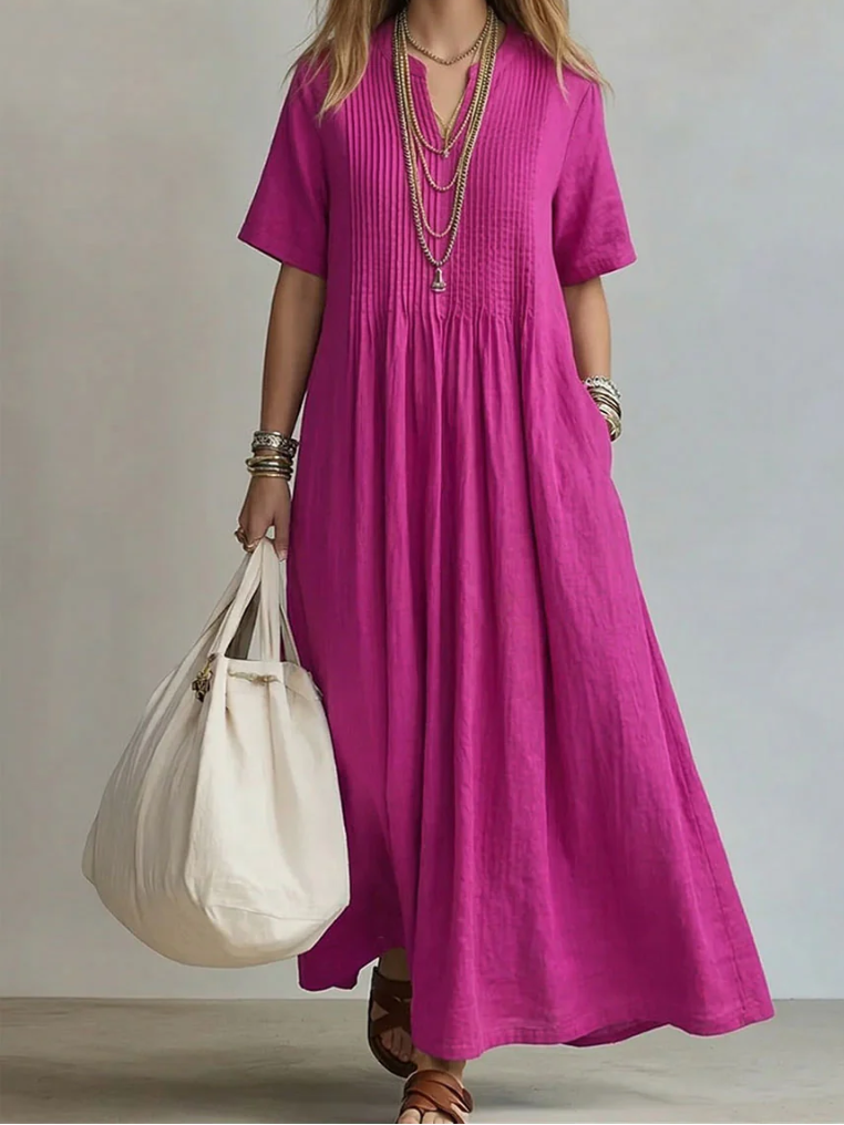 Vestido maxi fluido de mujer con pliegues y escote V, ideal para verano casual. Ropa femenina elegante y fresca.