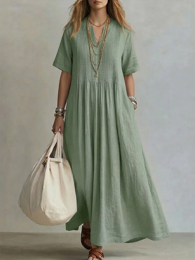 Vestido de mujer de algodón fresco con corte fluido y escote en V, perfecto para tallas grandes.
