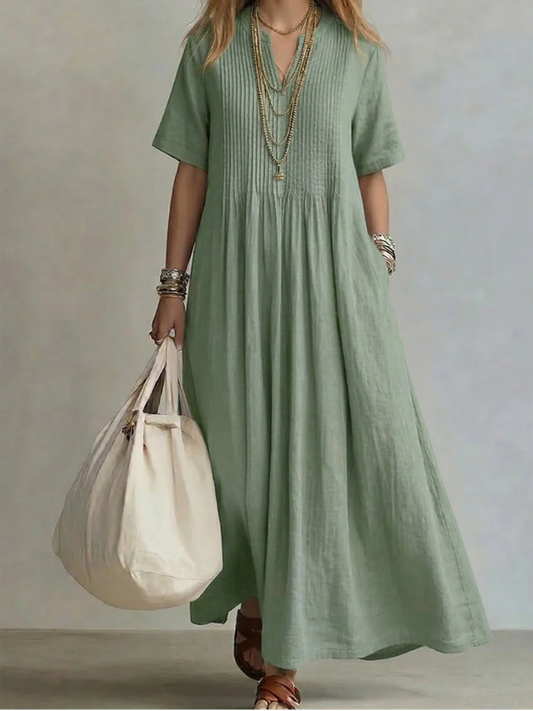 Vestido maxi de mujer con escote V pronunciado y pliegues. Estilo fluido, casual y boho chic. Perfecto para el verano.