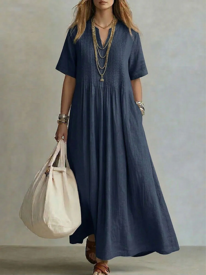 Vestido maxi de algodón con escote en V y corte fluido, look casual para mujer, ideal para días de verano.