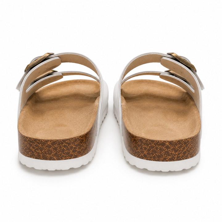 Sandalias unisex blancas con correas y hebillas ajustables, diseñadas para brindar comodidad y soporte en verano.