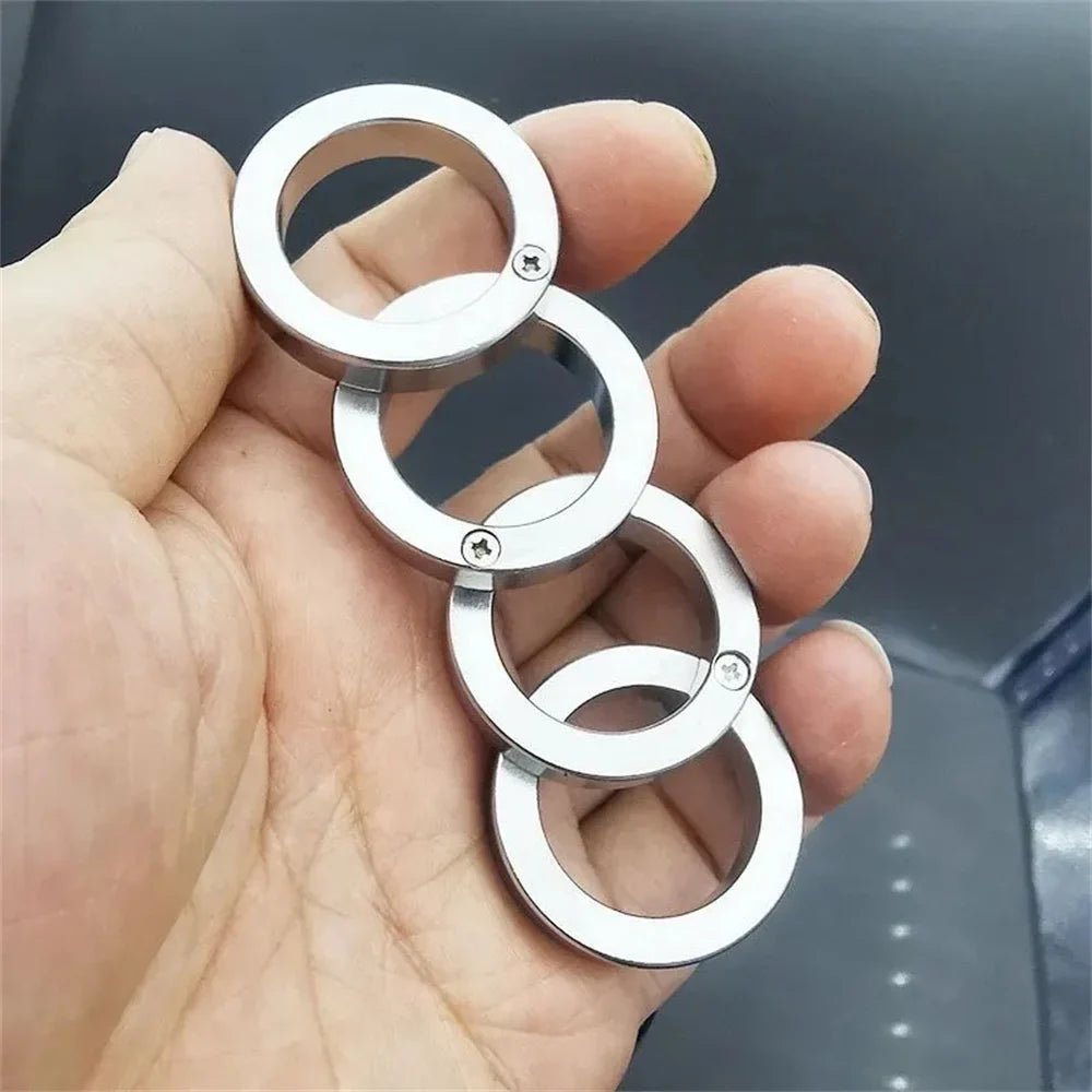 Anillo plegable unisex de acero inoxidable, ideal para seguridad personal y estilo.