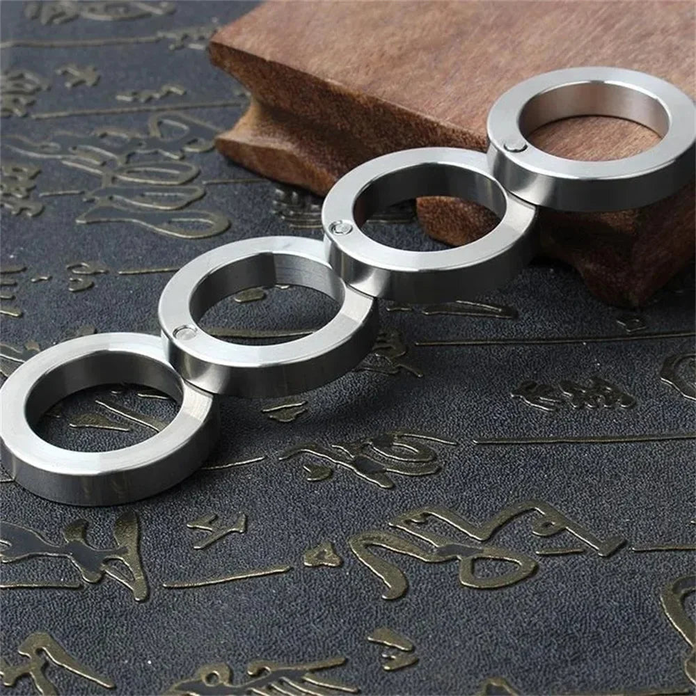 Regalo de protección: anillo de autodefensa plegable de acero inoxidable para seguridad personal.