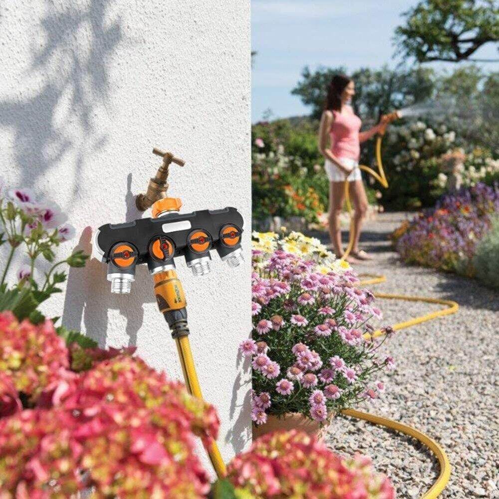 Divisor de manguera de jardín robusto con 4 válvulas, esencial para la distribución de agua en exteriores.