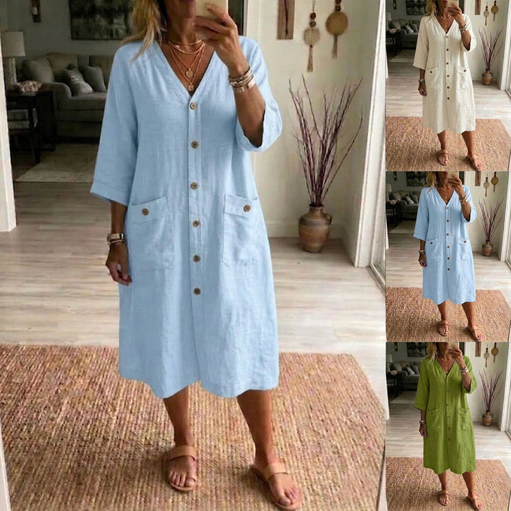 Vestido midi casual de mujer con cuello en V y botones, en suave algodón y lino. Ideal para días cálidos.