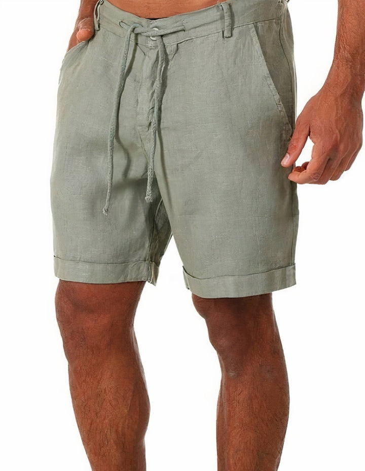 Pantalones cortos de lino con cintura elástica y puños, diseño moderno y fresco.