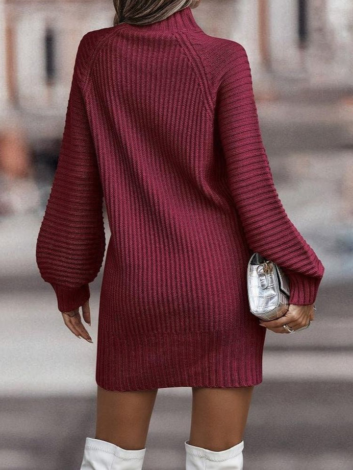 Vestido moderno de invierno para mujer. Diseño chic, cuello alto y mangas amplias. Ropa femenina versátil para el frío.
