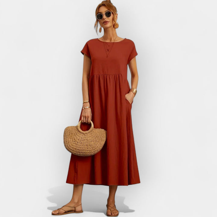 Vestido midi casual para mujer, manga corta, bolsillos laterales, ideal para el ocio y paseo.