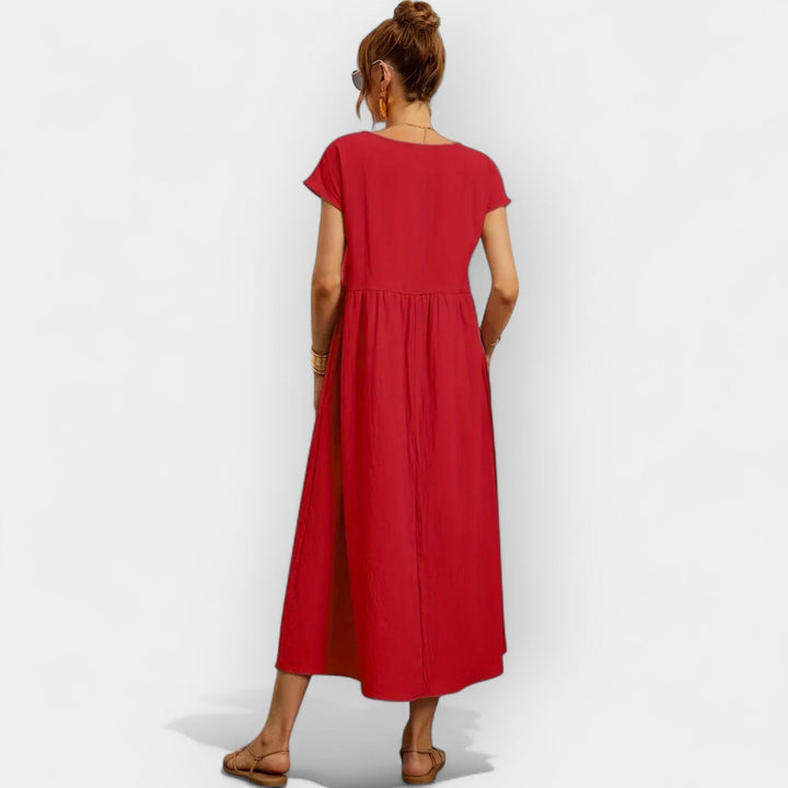 Vestido midi versátil para mujer, estilo casual, manga corta, bolsillos, tela cómoda de algodón.