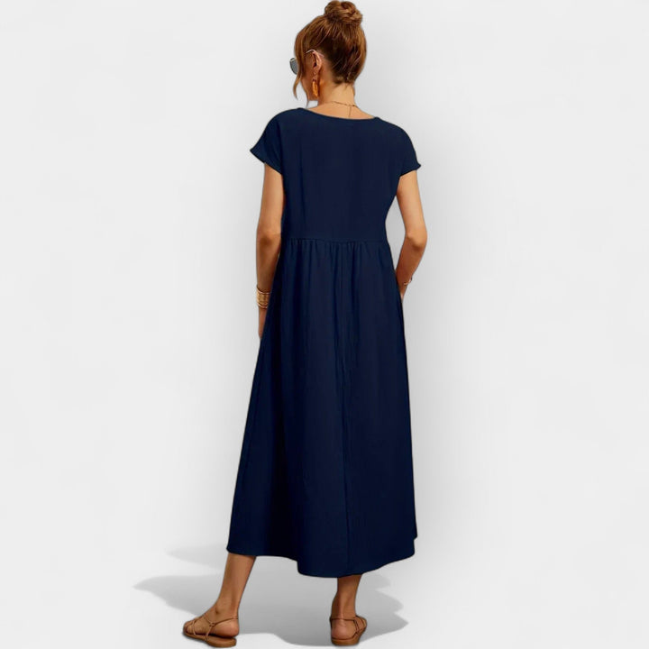 Vestido midi de verano para mujer, corte casual, tela de algodón suave, bolsillos funcionales.