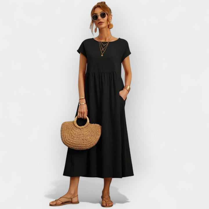Vestido midi de manga corta para mujer, estilo casual con bolsillos, perfecto para un look relajado.
