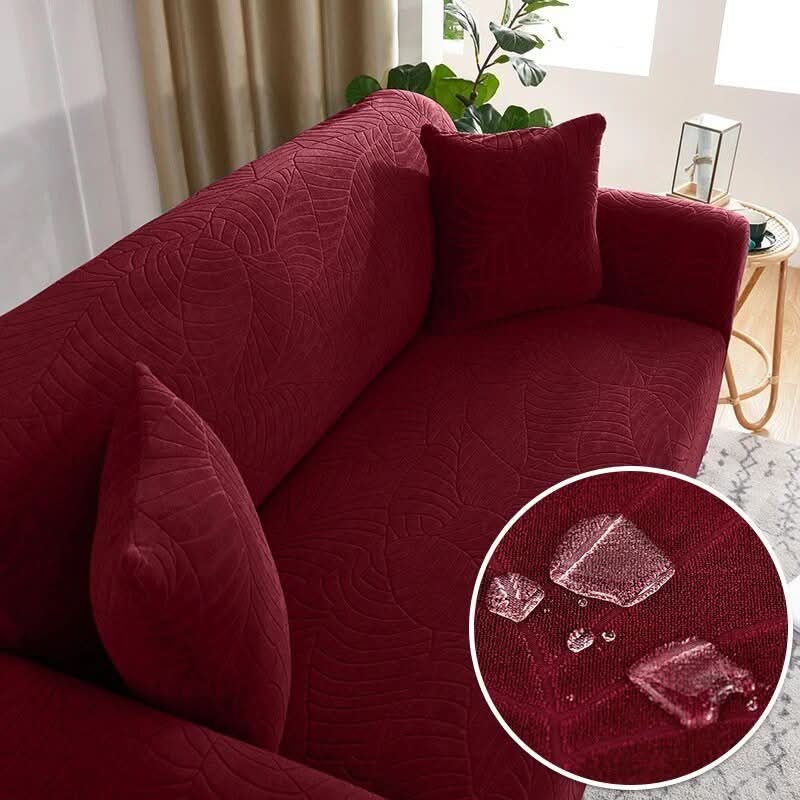 Funda de sofá elástica marrón, elegancia natural para cualquier estilo de decoración.