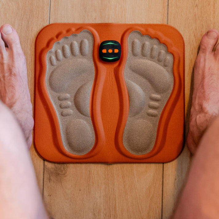 Cuidado personal: Estimulador eléctrico para pies, ideal para alivio de neuropatía y promover circulación.
