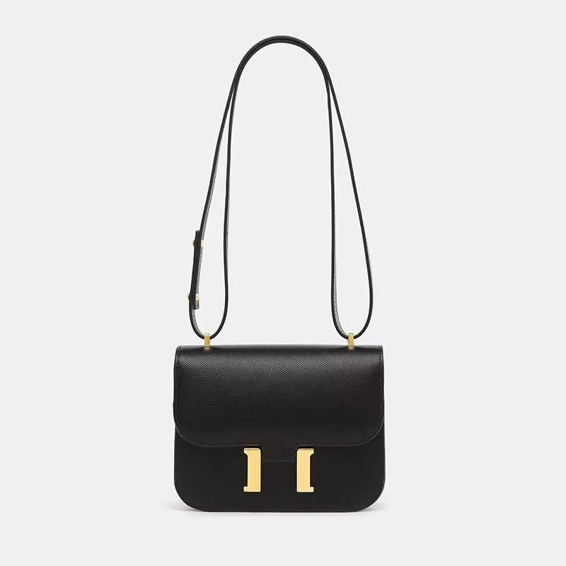 Bolso bandolera de mujer, estilo veraniego con estampado tropical, ideal para looks casuales.