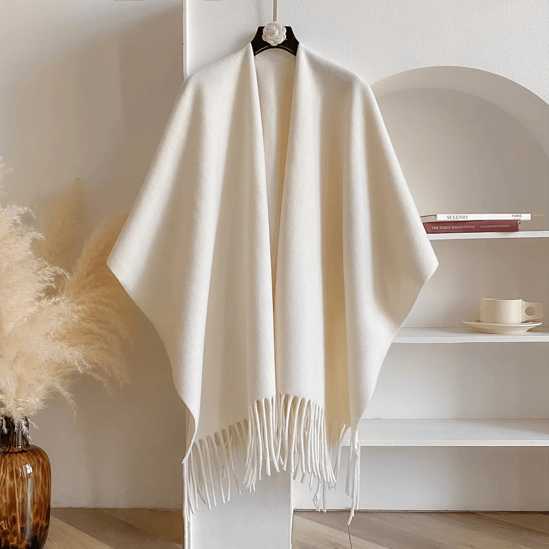 Poncho reversible para mujer, combina estilo y calidez. Ideal para otoño e invierno, un accesorio de moda elegante.