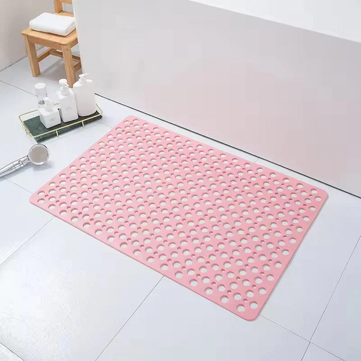Alfombra antideslizante para ducha con múltiples ventosas, agarre firme y estabilidad en superficies mojadas.