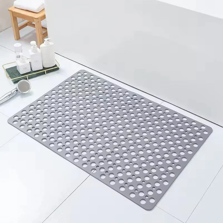 Alfombra antideslizante para ducha con ventosas, garantiza seguridad máxima y previene caídas en el baño.