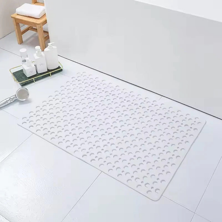 Alfombra de ducha antideslizante, material duradero y de fácil limpieza para un baño higiénico.