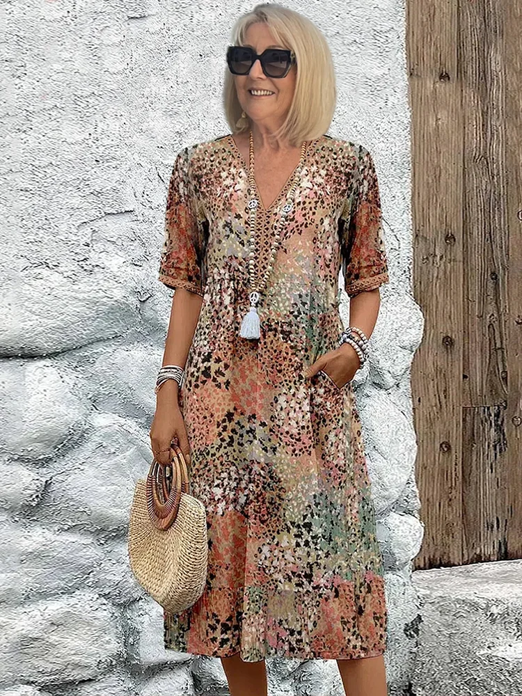 Vestido midi de mujer, ideal para el verano, con tela transpirable y corte elegante.