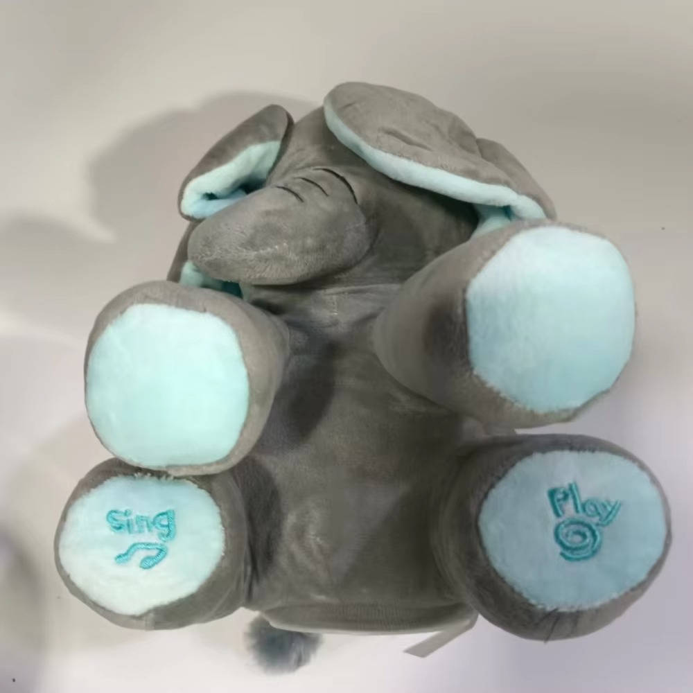 Peluche de elefante parlante y movible, estimula la interacción y el juego creativo.