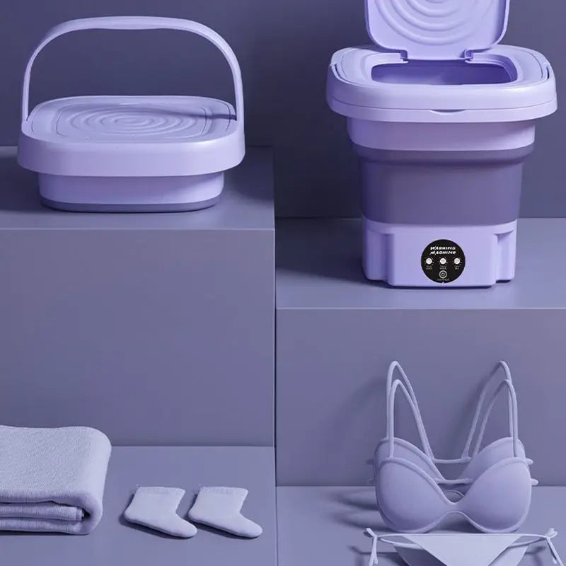 Detalle de la función de secadora de ropa en la lavadora portátil, secado rápido y compacto para prendas pequeñas.