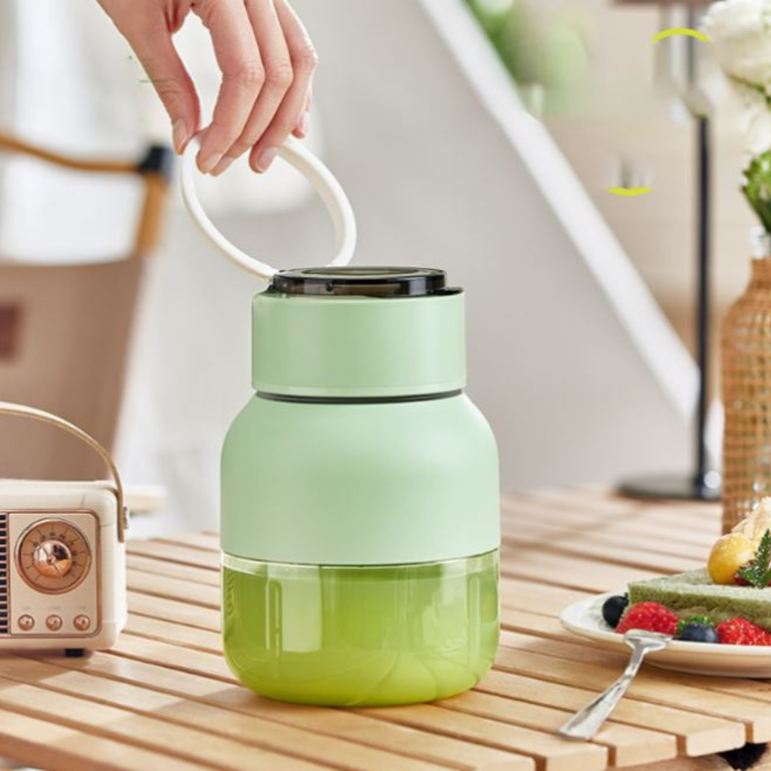 Mezclador y extractor de jugos portátil 2 en 1, ideal para batidos saludables en casa o al aire libre.