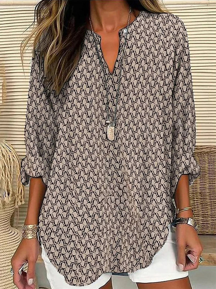 Blusa de mujer fluida y cómoda de manga larga, una prenda versátil para moda casual o estilo elegante.